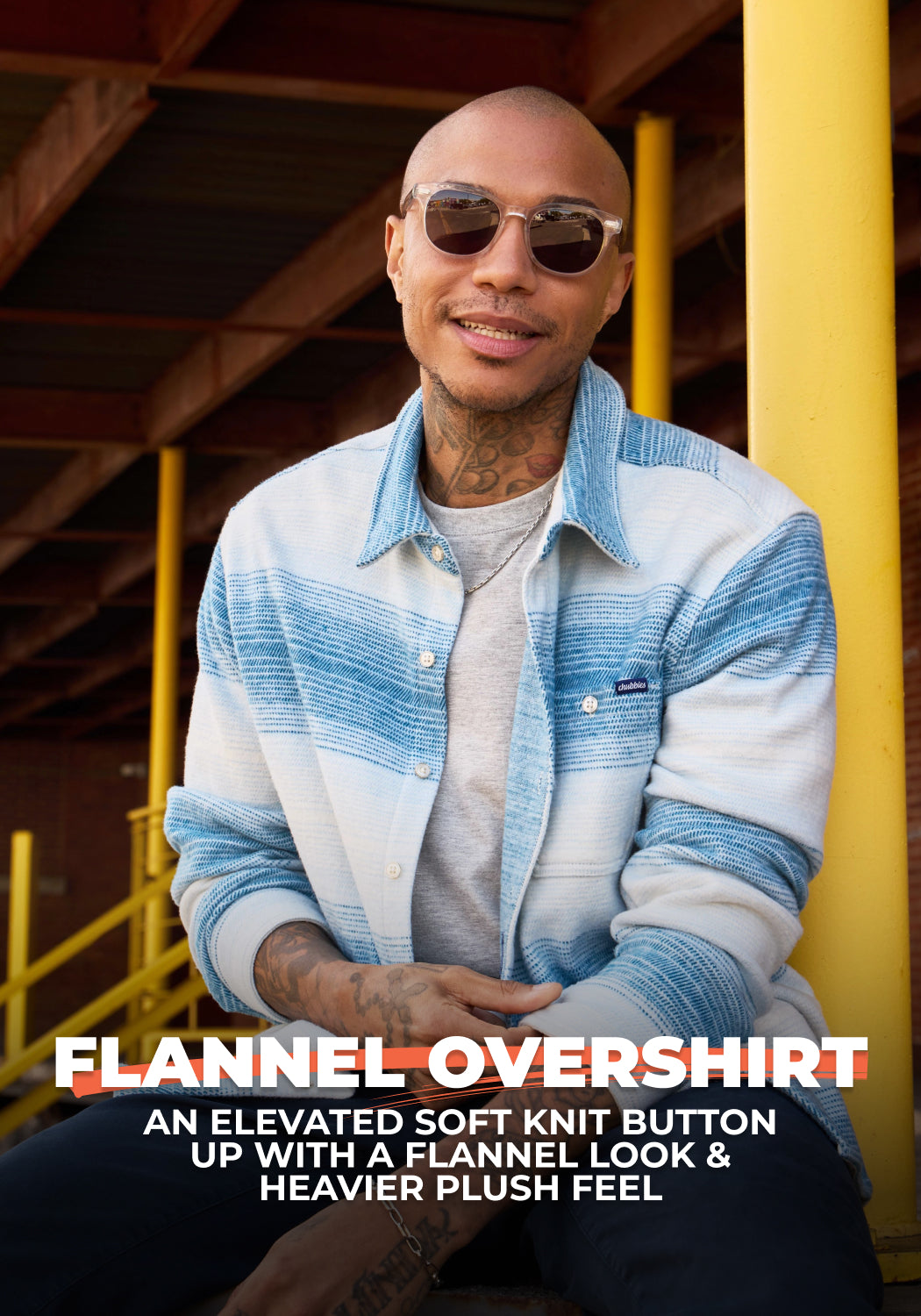 Man wearing flannel overshirt with text "An elevated soft knit button up with a flannel look & heavier plush feel"